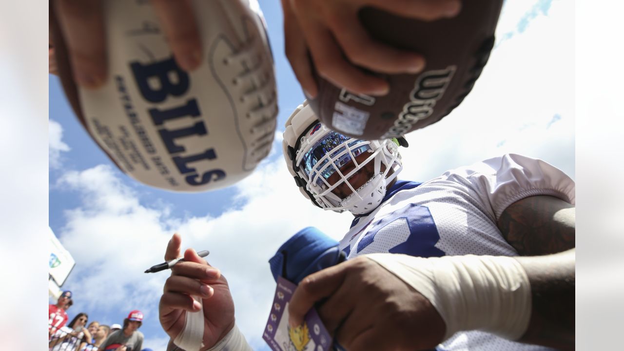 Buffalo Bills offensive tackle Dion Dawkins (73) greets fans after