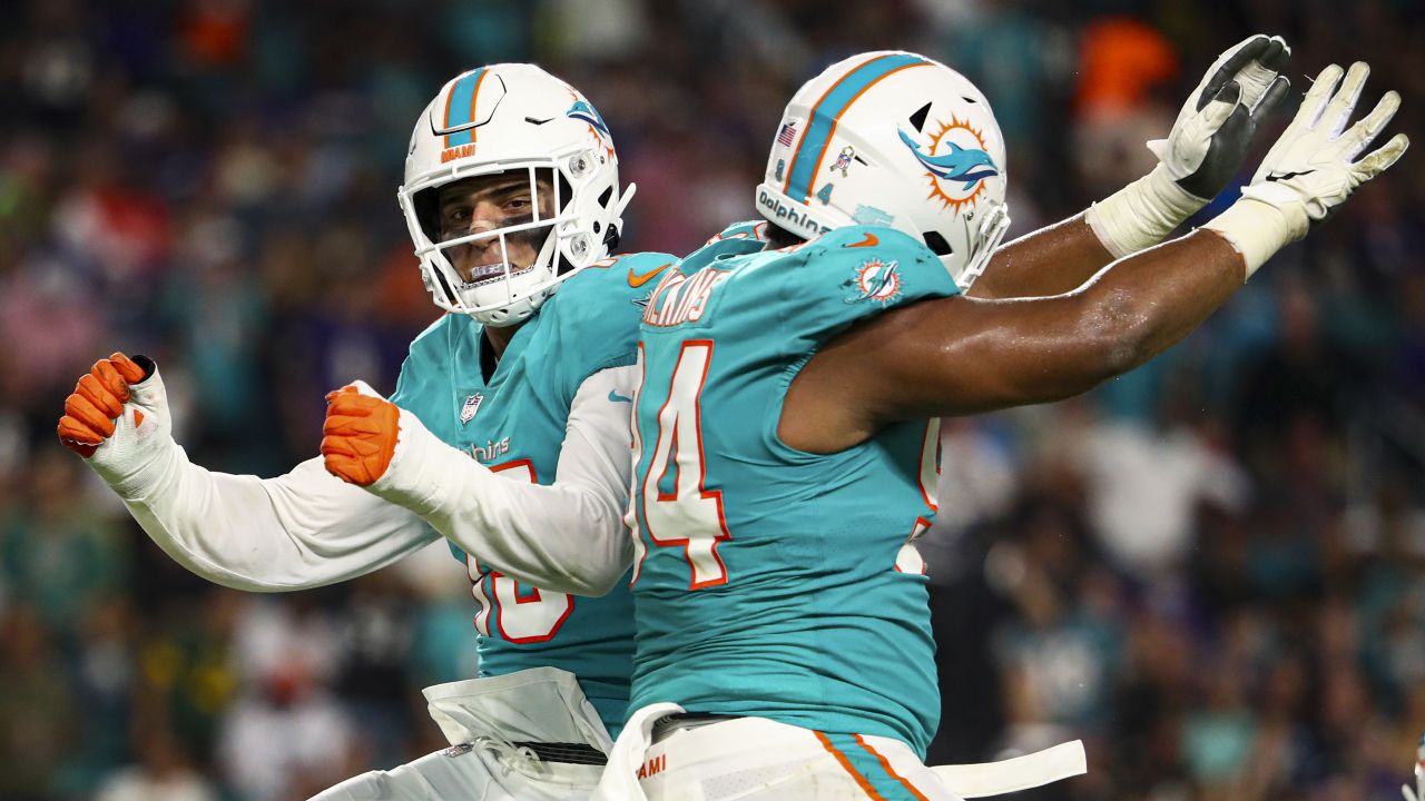 Miami Dolphins linebacker Jaelan Phillips (15) defends during an