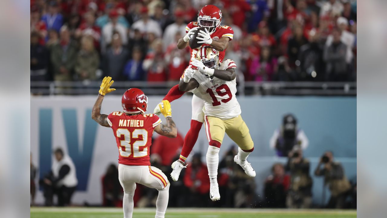 Kansas City Chiefs strong safety Tyrann Mathieu (32) runs off the field at  halftime of the NFL Super Bowl 54 football game between the San Francisco  49ers and Kansas City Chiefs Sunday