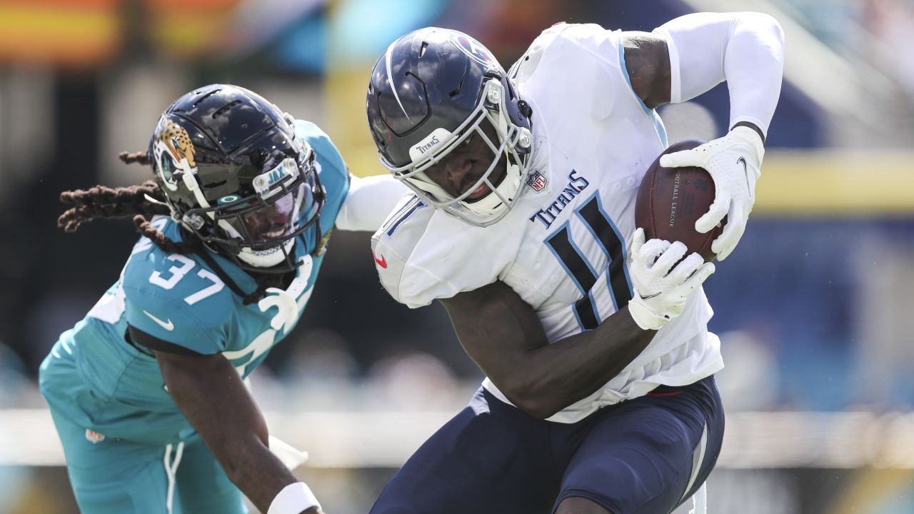 October 31, 2021: Tennessee Titans wide receiver A.J. BrownÂ (11) catches  the ball as Indianapolis Colts defensive back Kenny Moore (23) defends  during NFL football game action between the Tennessee Titans and