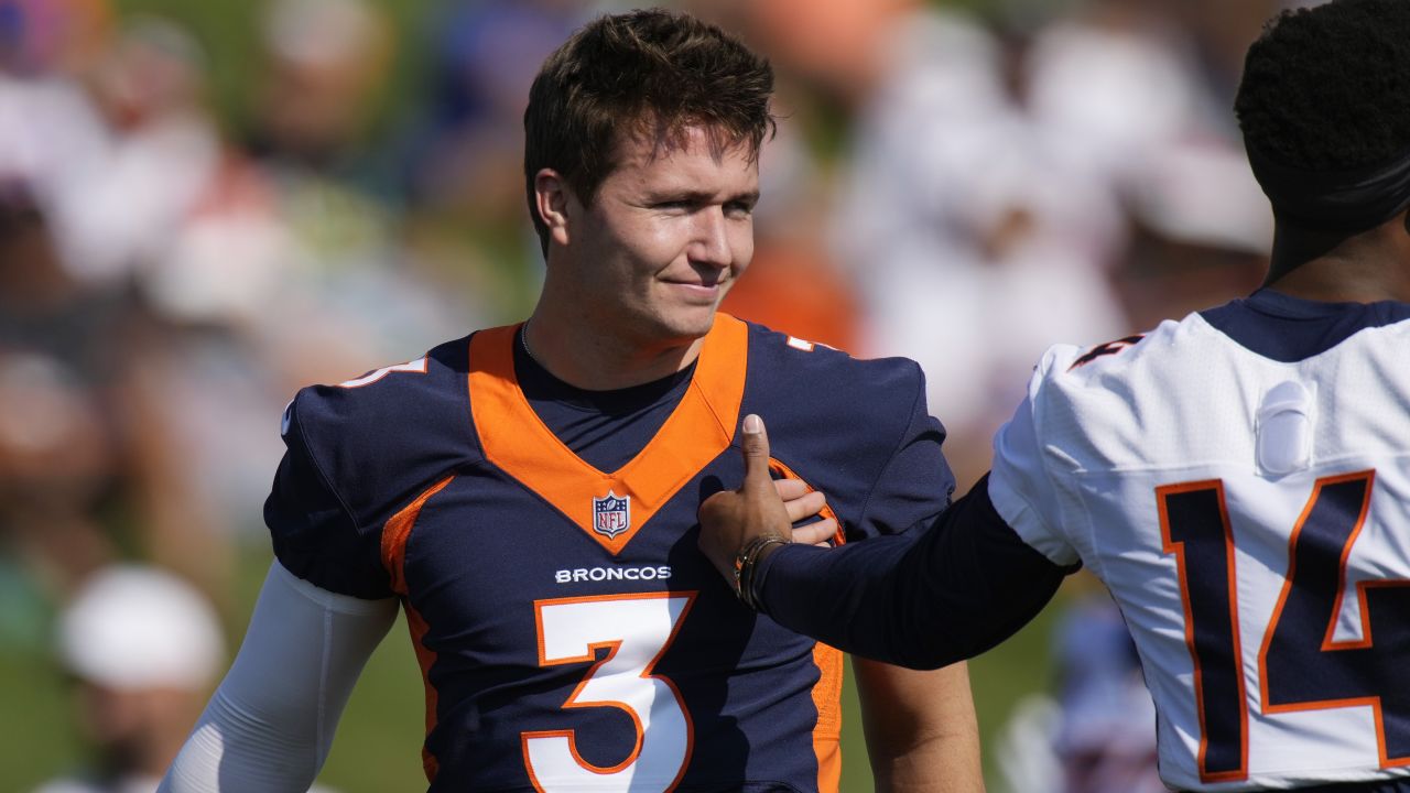 Denver Broncos quarterback Drew Lock (3) andd Denver Broncos quarterback  Teddy Bridgewater (5) taking part in drills at an NFL football training  camp at team headquarters Saturday, July 31, 2021, in Englewood