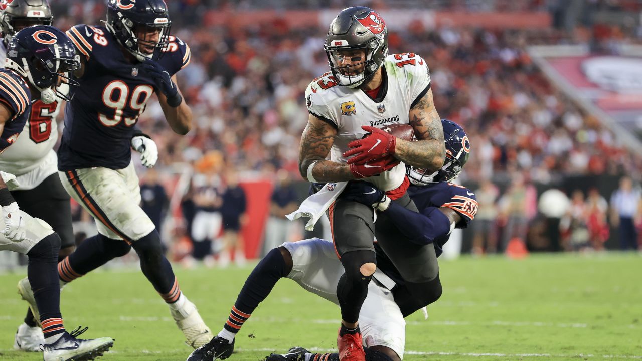 A Tampa Bay Buccaneers player wears a Salute to Service shirt prior to an  NFL football game against the New Orleans Saints, Sunday, Nov. 8, 2020, in  Tampa, Fla. (AP Photo/Kevin Sabitus