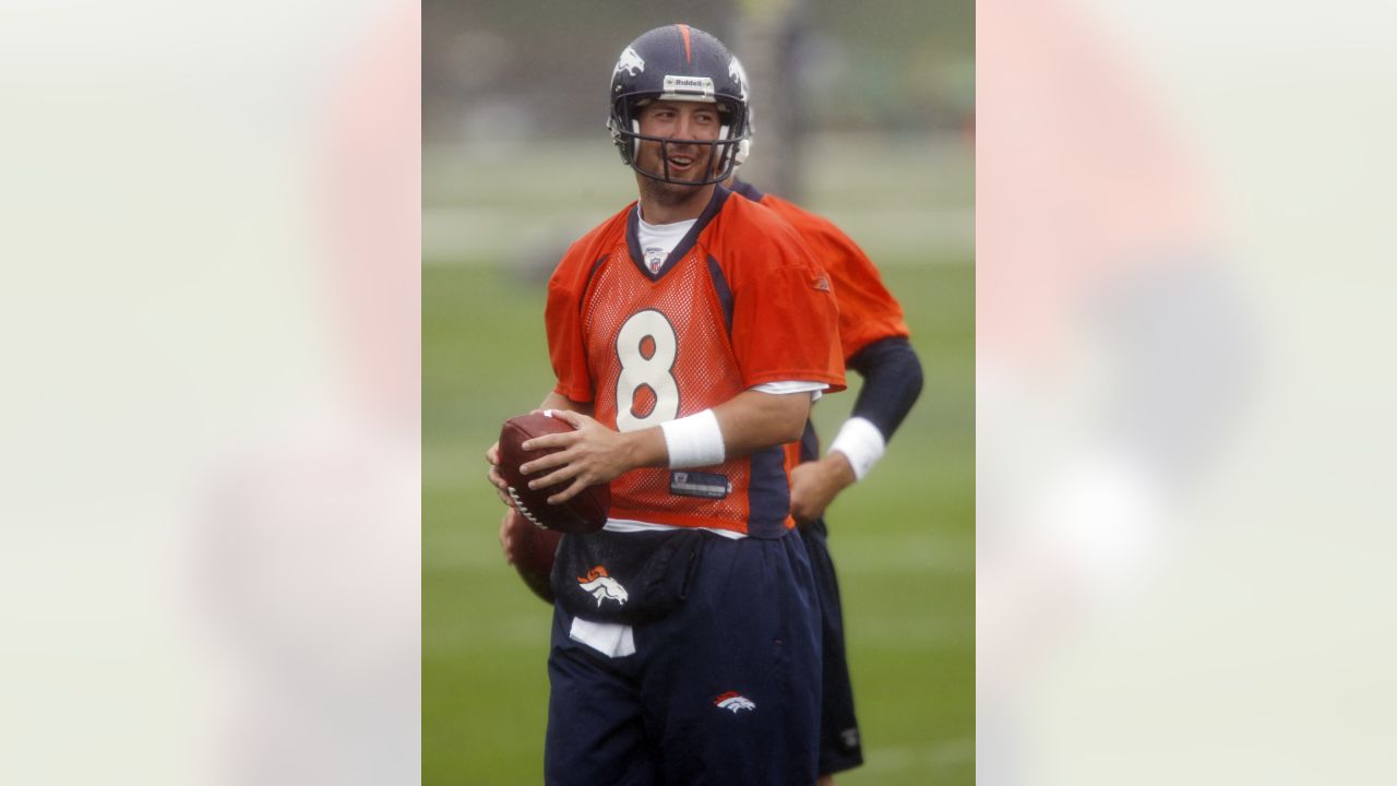 Denver Broncos running back Lance Ball runs a drill during