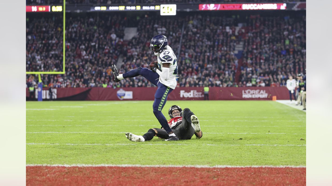 Seattle Seahawks cornerback Tariq Woolen (27) warms up before an NFL  football game against the Carolina