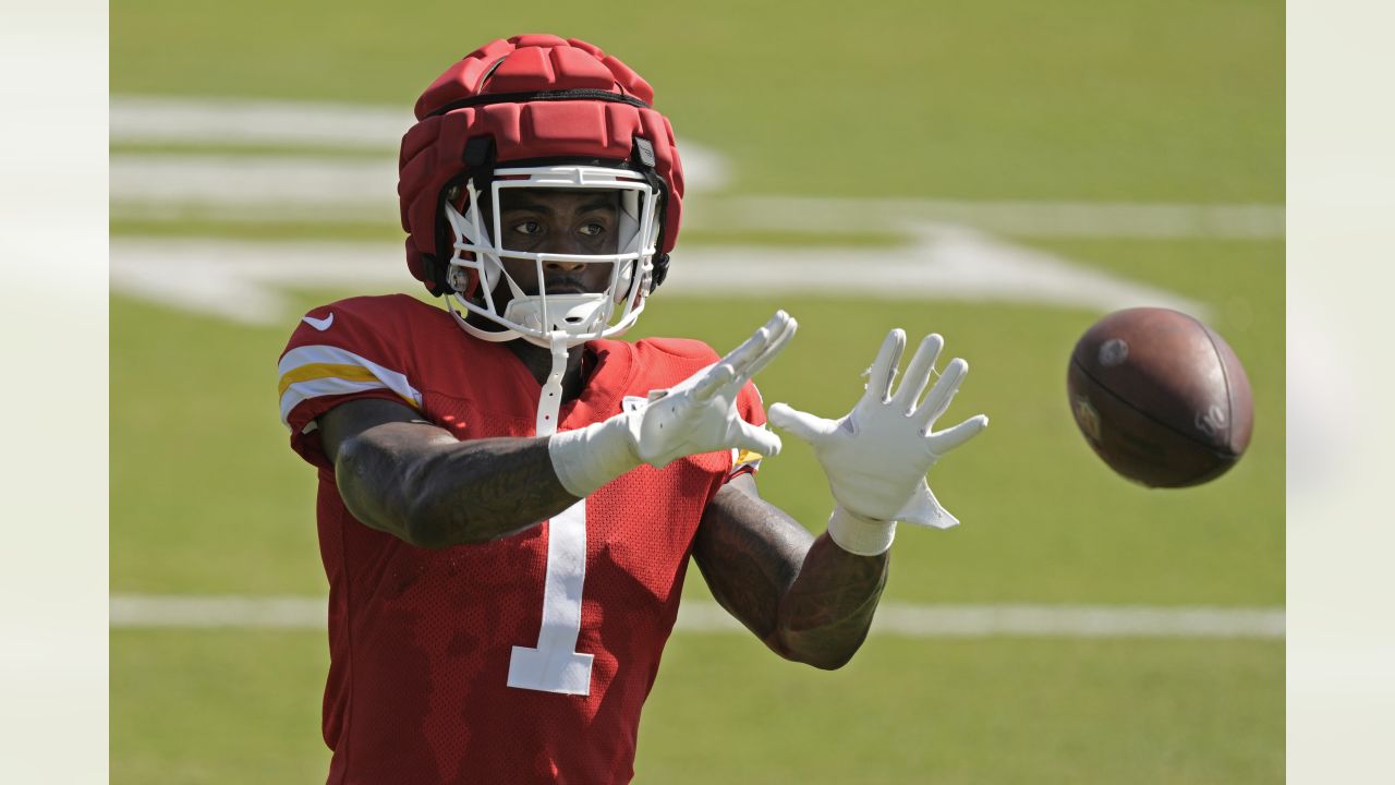 Kansas City Chiefs running back Jerrion Ealy, right, runs under pressure  from Kansas City Chiefs safety Mike Edwards during NFL football training  camp Saturday, July 29, 2023, in St. Joseph, Mo. (AP