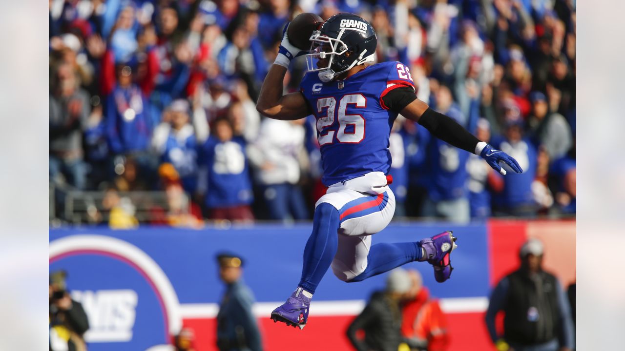 Detroit Lions defensive end Aidan Hutchinson (97) reacts after an  interception against the New York Giants during an NFL football game  Sunday, Nov. 20, 2022, in East Rutherford, N.J. (AP Photo/Adam Hunger