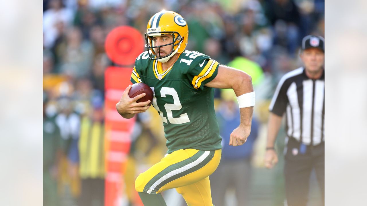 November 28, 2021: Green Bay Packers quarterback Aaron Rodgers (12) warming  up during the NFL football game between the Los Angeles Rams and the Green  Bay Packers at Lambeau Field in Green