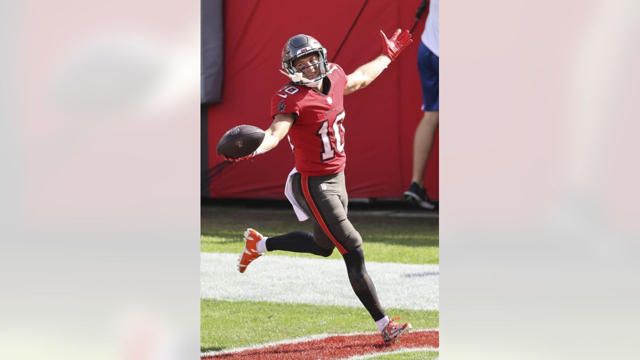 Tampa Bay Buccaneers wide receiver Scott Miller (10) runs the ball during  the second half of an NFL football game against the Atlanta Falcons,  Sunday, Dec. 20, 2020, in Atlanta. The Tampa