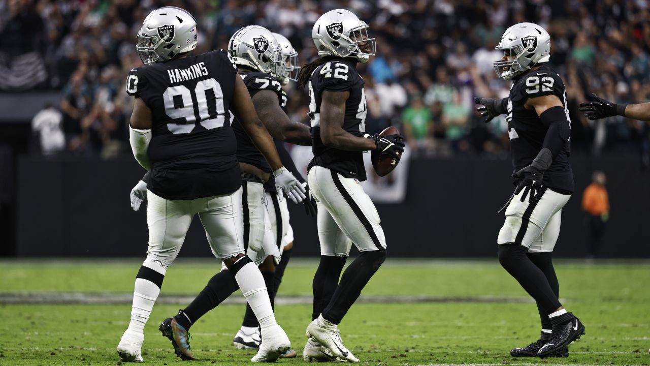 Las Vegas Raiders inside linebacker Cory Littleton (42) tackles New Orleans  Saints running back …