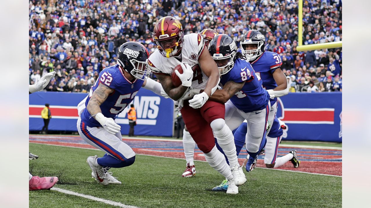 New York Giants wide receiver Marcus Johnson (84) walks off the field after  an NFL football