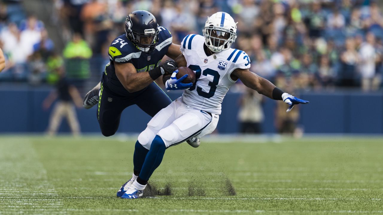 Seattle Seahawks running back, Robert Turbin (22) shows off his