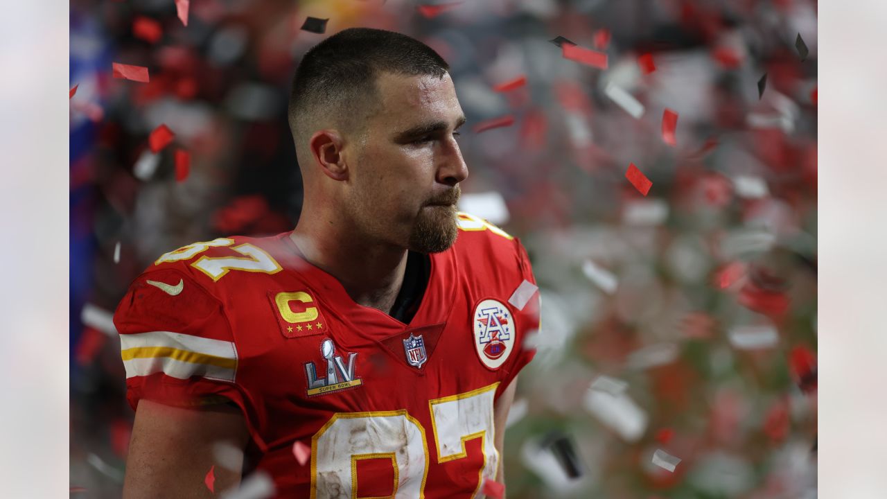 Kansas City Chiefs tight end Travis Kelce (87) holds up the Vince Lombardi  Trophy after the NFL Super Bowl 54 football game between the San Francisco  49ers and Kansas City Chiefs Sunday