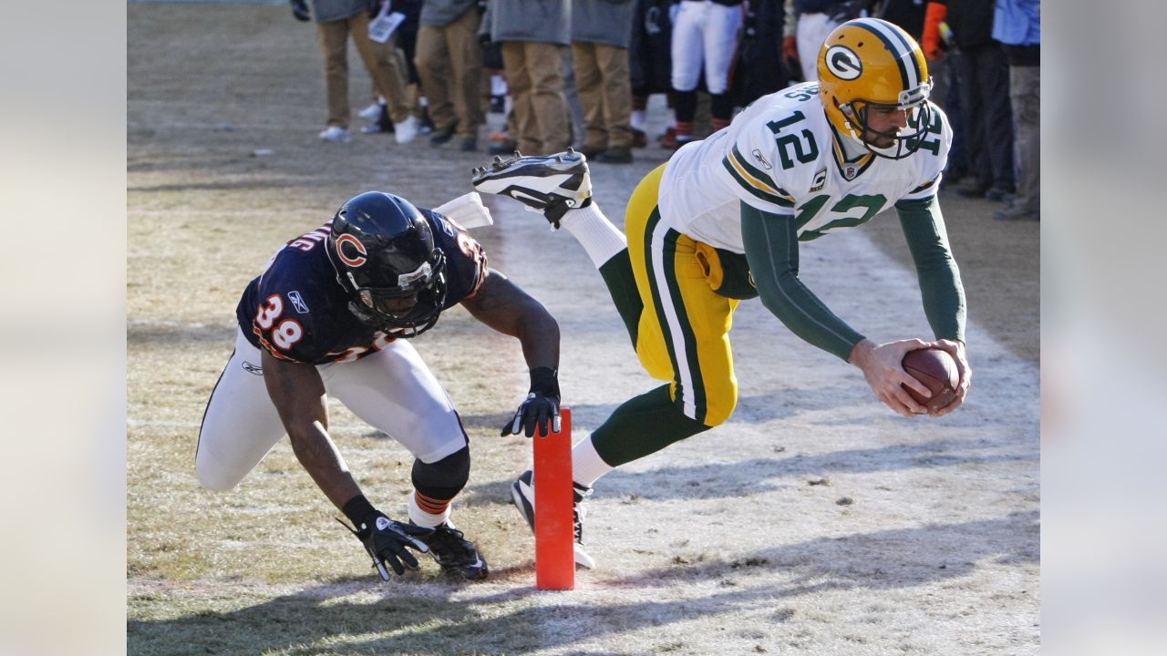 GREEN BAY, WI - DECEMBER 25: Green Bay Packers quarterback Aaron Rodgers  (12) drops back to pass during a game between the Green Bay Packers and the  Cleveland Browns on December 25