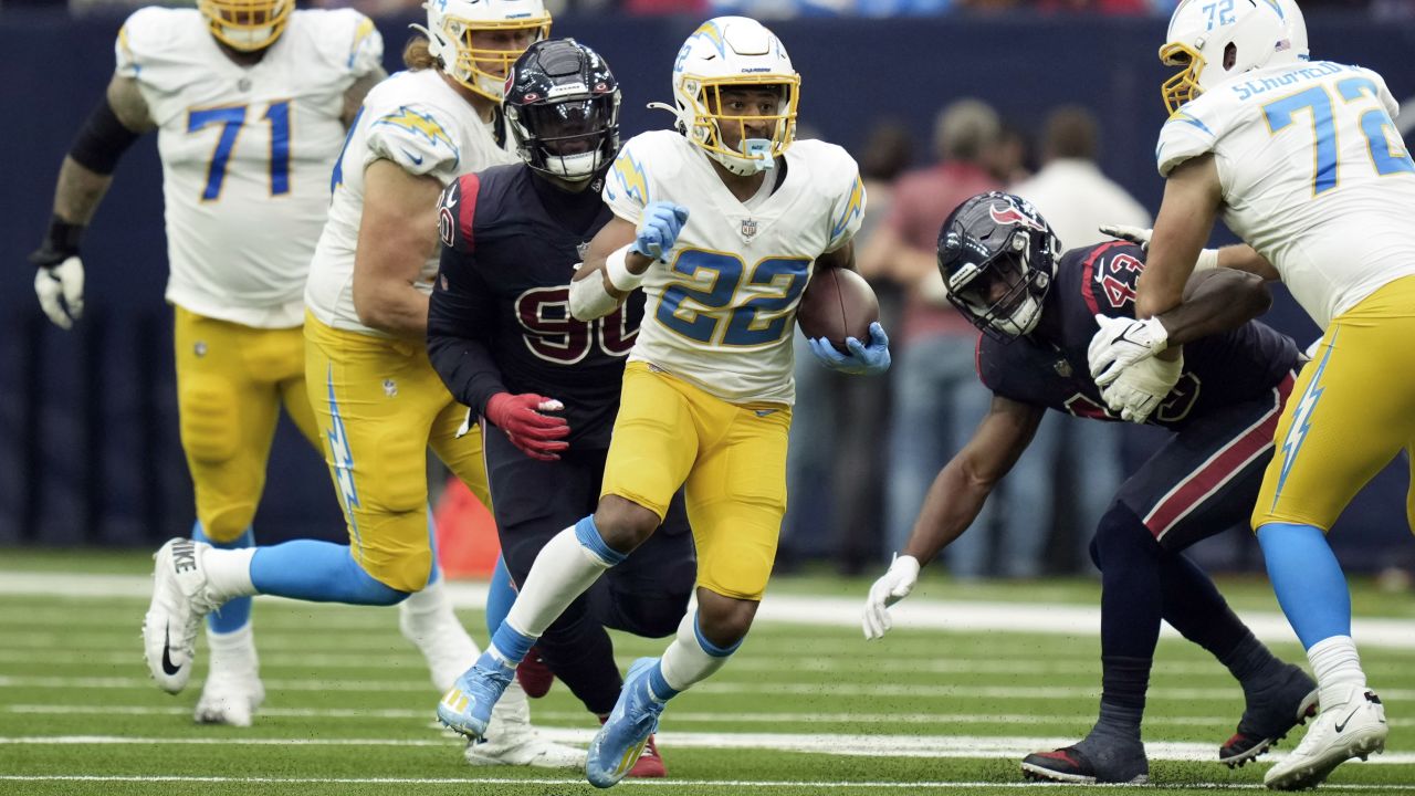 Houston, TX, USA. 26th Dec, 2021. Los Angeles Chargers running back Justin  Jackson (22) celebrates his touchdown with Chargers fans in the stands  during the second quarter of an NFL football game