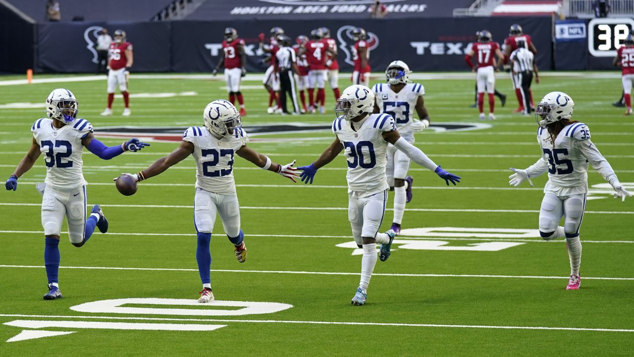 Indianapolis Colts cornerback Kenny Moore II (23) celebrates with teammates after an interception against the Houston Texans.