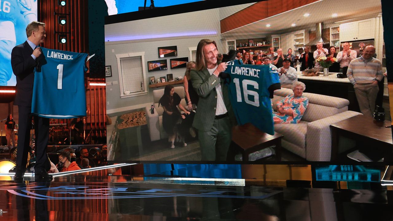 NFL Commissioner Roger Goodell holds a Jacksonville Jaguars jersey as he announces that the Jaguars had chosen Clemson quarterback Trevor Lawrence with the first pick during the 2021 NFL Draft on Thursday, April 29, 2021 in Cleveland, Ohio.