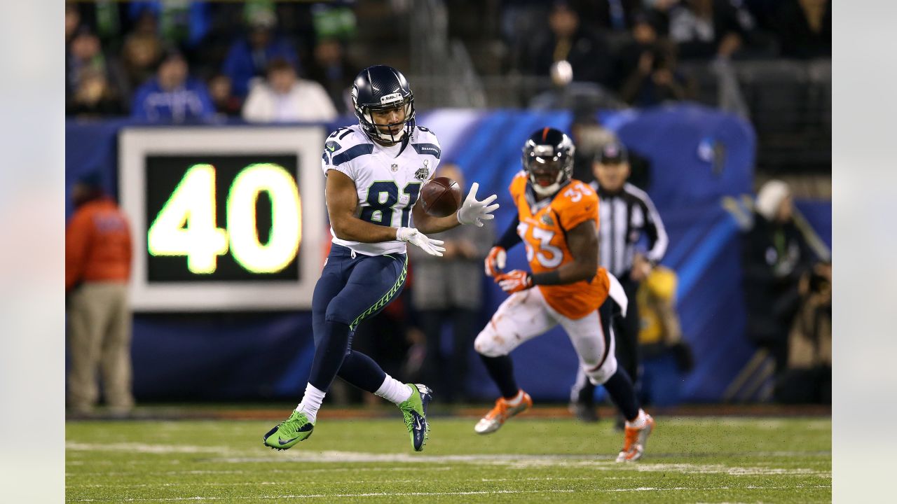 Seattle Seahawks wide receiver Percy Harvin (11) runs the opening kick off  of the second half for a 87 yard touchdown at the Super Bowl XLVIII at  MetLife Stadium in East Rutherford