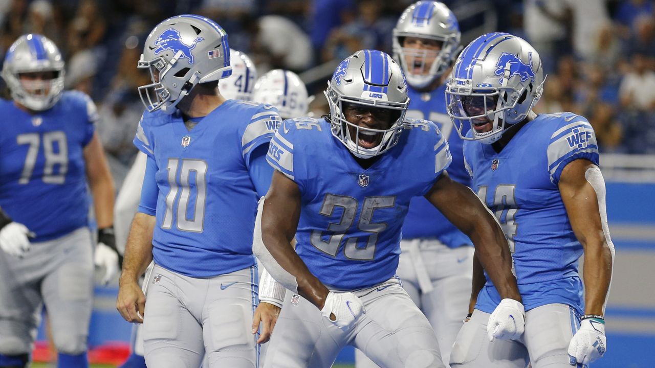 Detroit Lions running back Godwin Igwebuike (35) is tackled during the  first half of an NFL foo …