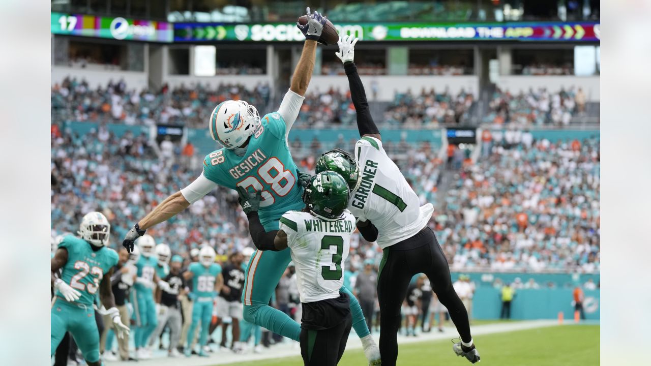 Miami Dolphins tight end Mike Gesicki (88) waves to the fans as he