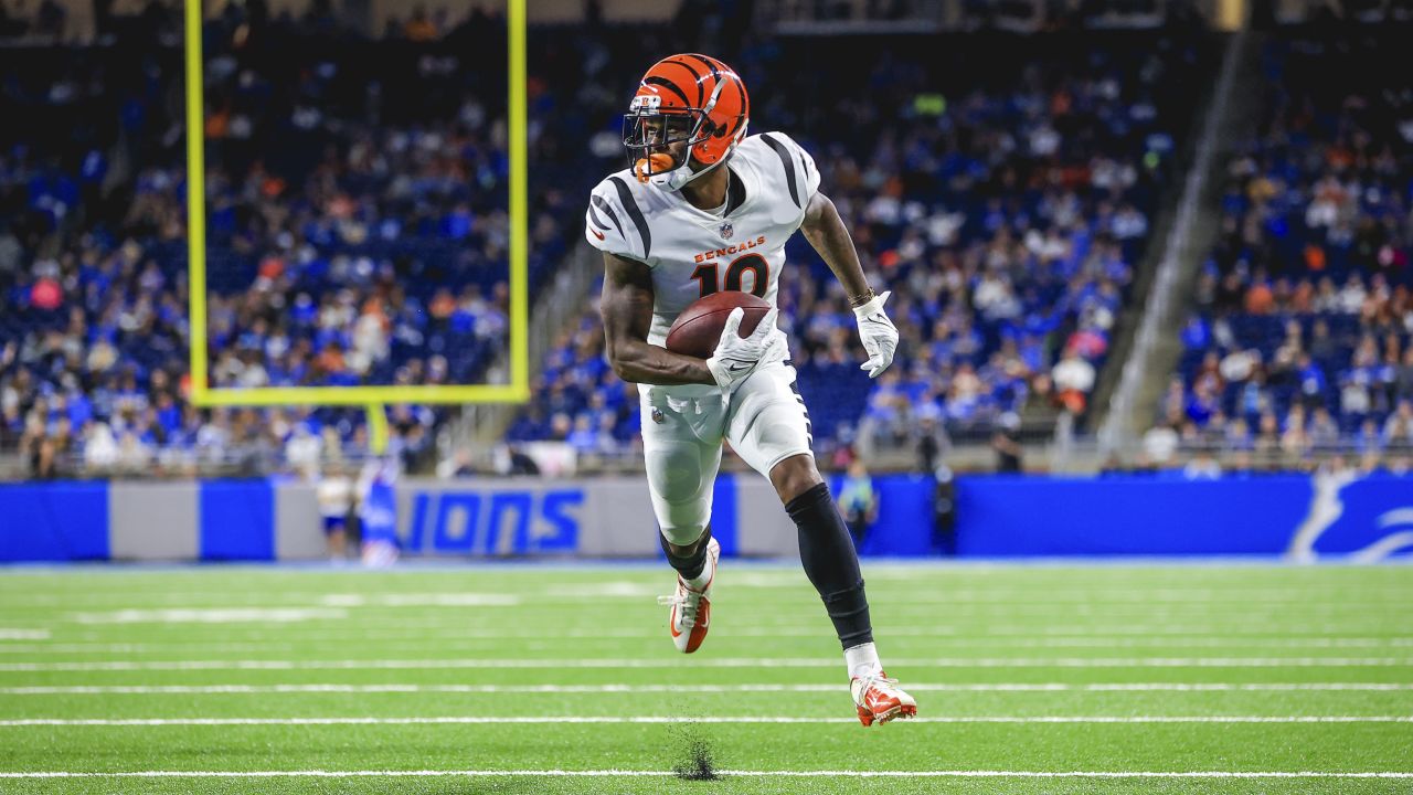 Cincinnati Bengals wide receiver Auden Tate (19) is brought down