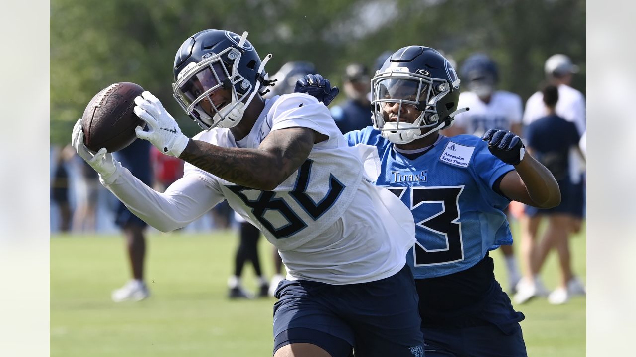 October 31, 2021: Tennessee Titans wide receiver A.J. BrownÂ (11) catches  the ball as Indianapolis Colts defensive back Kenny Moore (23) defends  during NFL football game action between the Tennessee Titans and