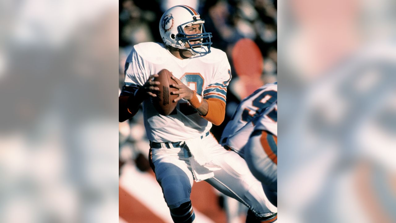 An August 15, 1995 file photo of Miami Dolphins' head coach Don Shula talks  with quarterback Dan Marino during practice at the team's training facility  in Davie, Fla. Six years after the