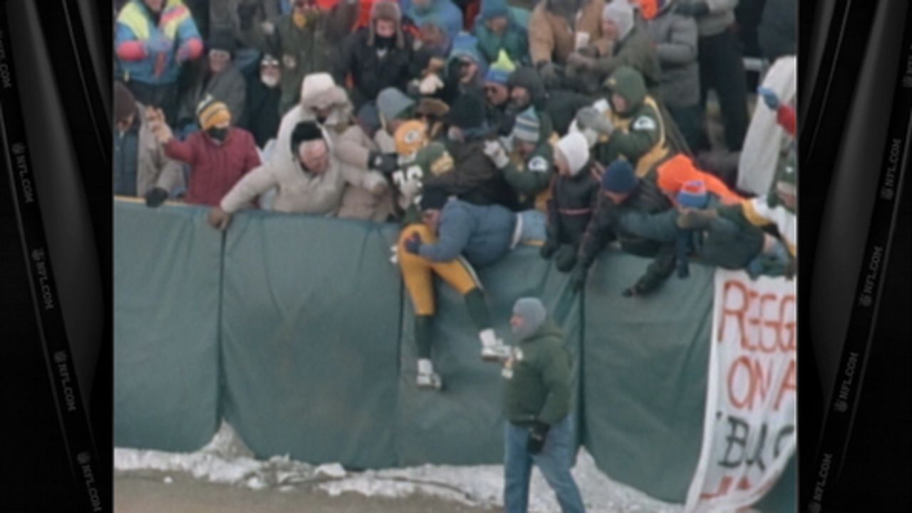 Green Bay Packers' LeRoy Butler (36) jumps into the crowd after  intercepting a Cincinnati Bengals pass in the end zone in the fourth  quarter Sunday, Dec. 3, 1995, in Green Bay, Wis.