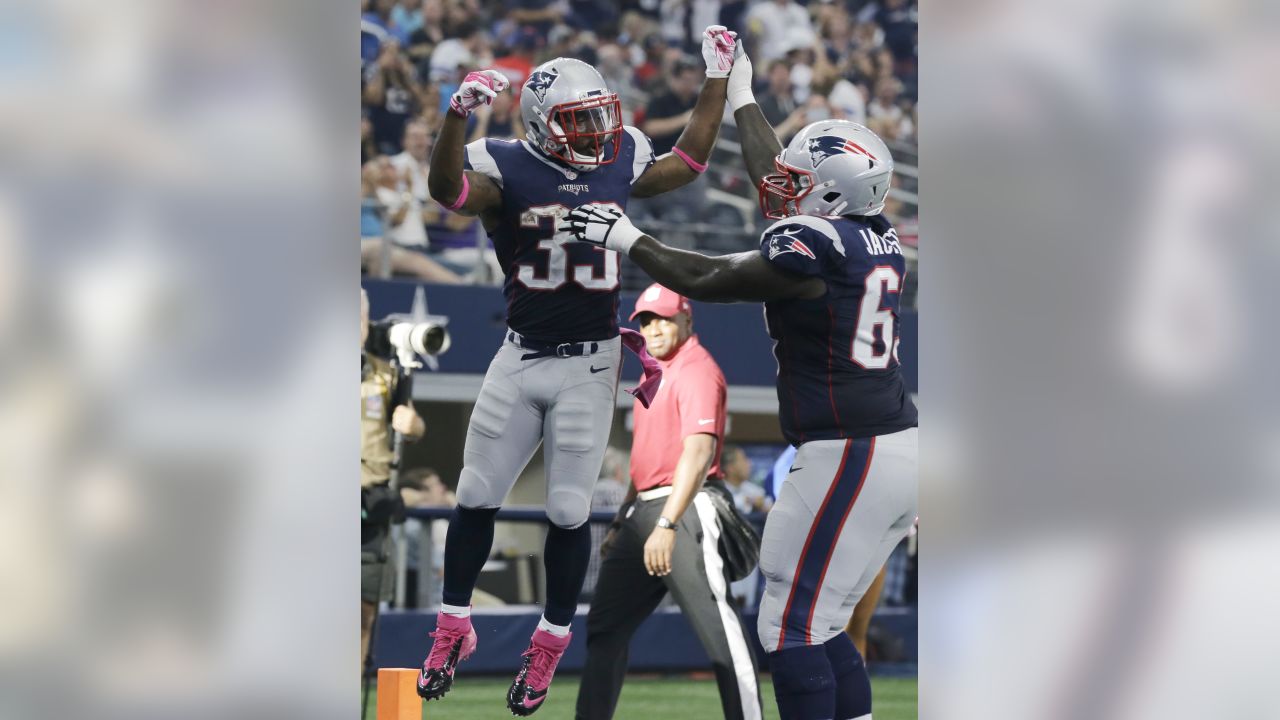 New England Patriots' Jamie Collins (91), Duron Harmon (30) and Devin  McCourty (32) celebrates after they recovered fumble by Dallas Cowboys'  Jason Witten during the second half of an NFL football game