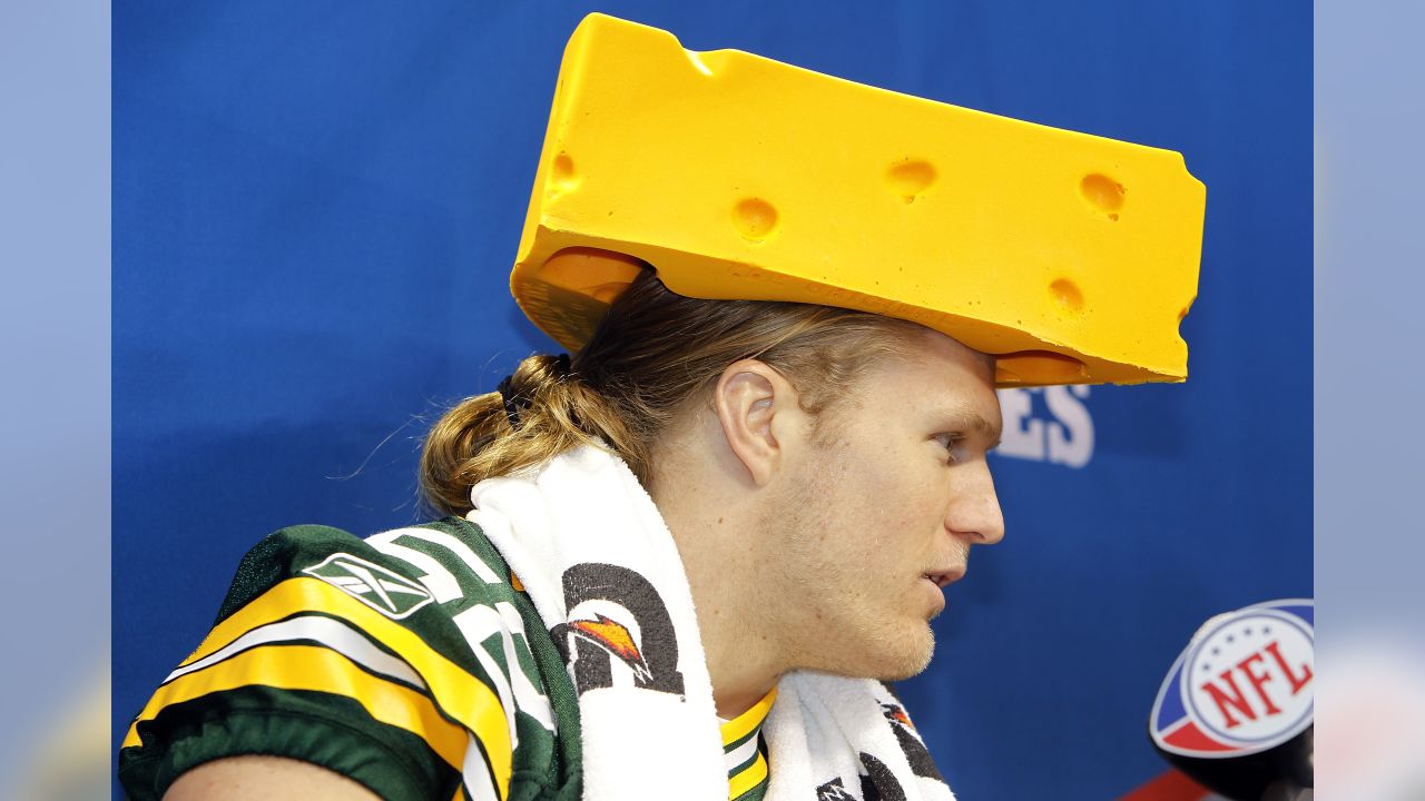 Nichole Campbell, left, and Barbie Gossen wear fresh flower covered  cheeseheads before an NFL preseason football game between the Green Bay  Packers and the Arizona Cardinals Friday, Aug. 19, 2011, in Green