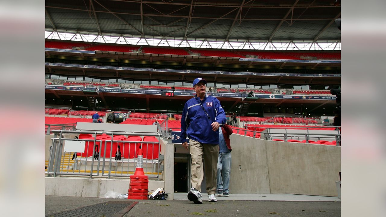 A Miami Dolphins fan arrives for the NFL International Series game between  the Miami Dolphins and the Jacksonville Jaguars at Tottenham Hotspur Stadiu  Stock Photo - Alamy