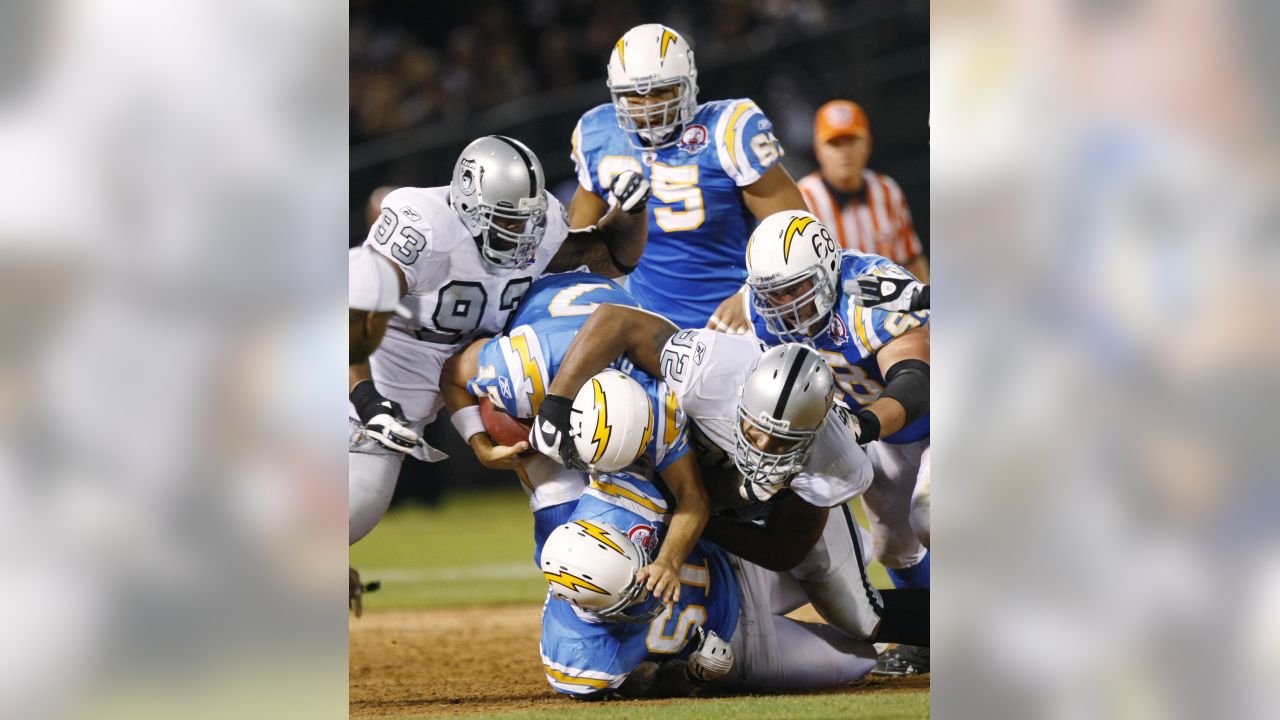 Oakland Raiders wide receiver Louis Murphy hauls in a 57-yard touchdown grab  against the San Diego Chargers during the fourth quarter of an NFL football  game in Oakland, Calif., Monday, Sept. 14