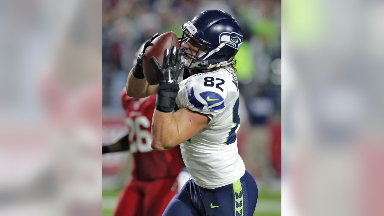 Arizona Cardinals wide receiver Larry Fitzgerald (11) runs after the catch  as Seattle Seahawks middle linebacker Bobby Wagner (54) pursues during the  second half of an NFL football game, Thursday, …