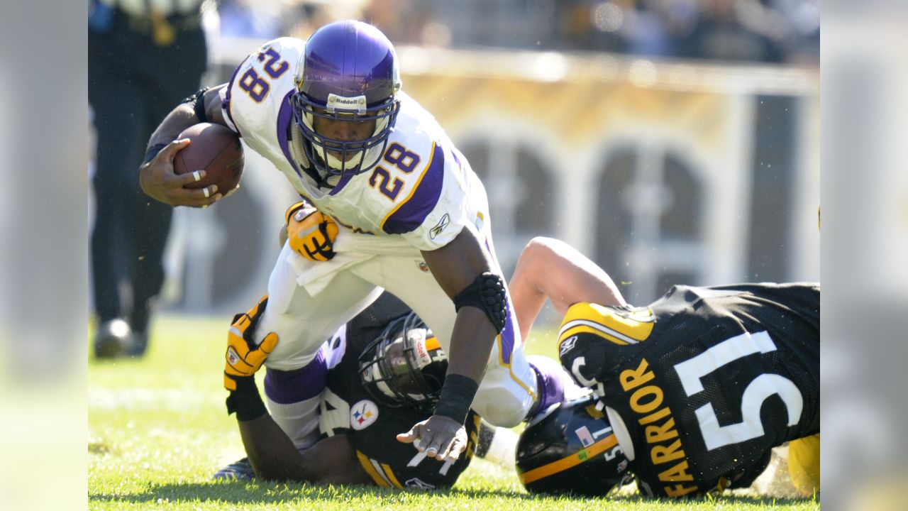 The number seven overall pick at the 2007 NFL DRAFT Oklahoma running back Adrian  Peterson poses with his Minnesota Vikings jersey at the 2007 NFL Draft  ceremonies at Radio City Music Hall