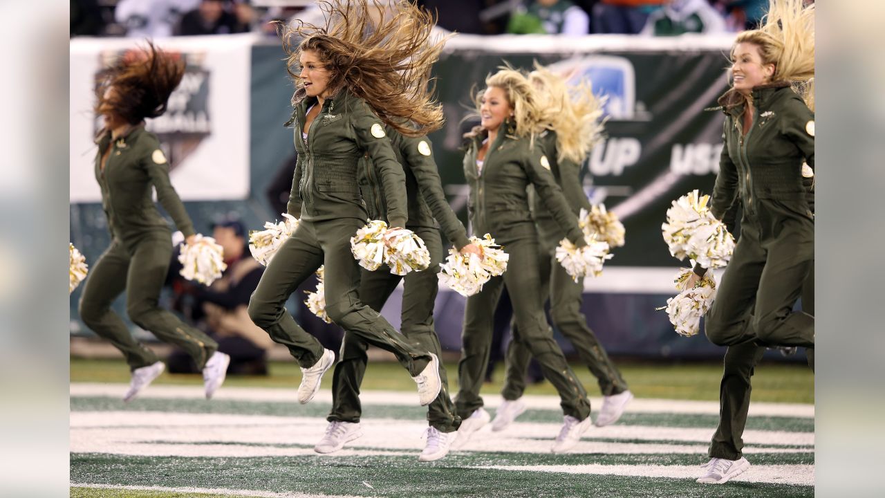 New York Jets Cheerleaders perform during half time at the 8th Annual  DirecTV Beach Bowl Celebrities vs. NFL Greats at Pier 40 in New York, NY,  on February 1, 2014(Photo by Anthony