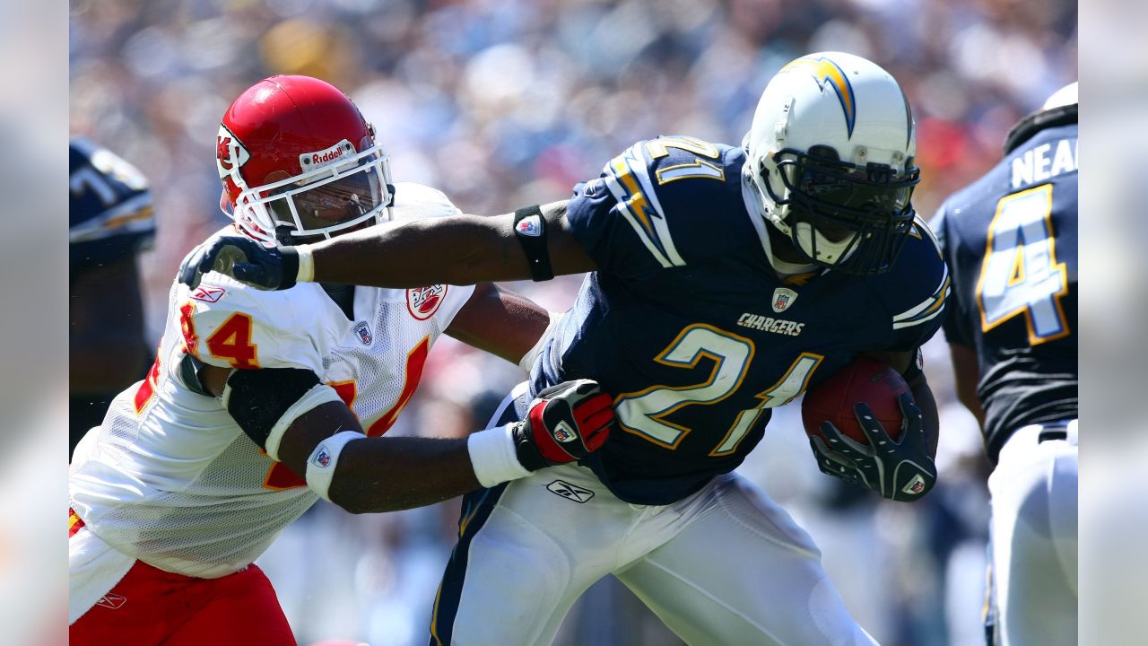 Larry Johnson of the Kansas City Chiefs is tackled by Luis Castillo News  Photo - Getty Images