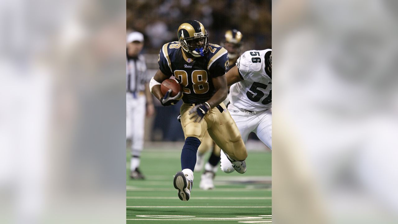 September 23, 2001 - San Francisco, California, U.S - St. Louis Rams  running back Marshall Faulk (28) runs with ball on Sunday, September 23,  2001, in San Francisco, California. The Rams defeated