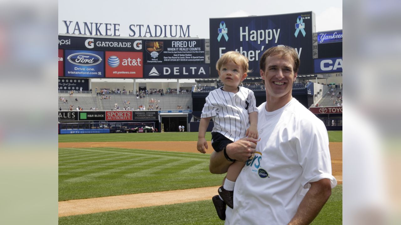 NFL football Super Bowl XLIV Drew Brees wears a borrowed New York Yankees  World Series ring alongside his Super Bowl ring in the dugout before a  baseball game between the Yankees and