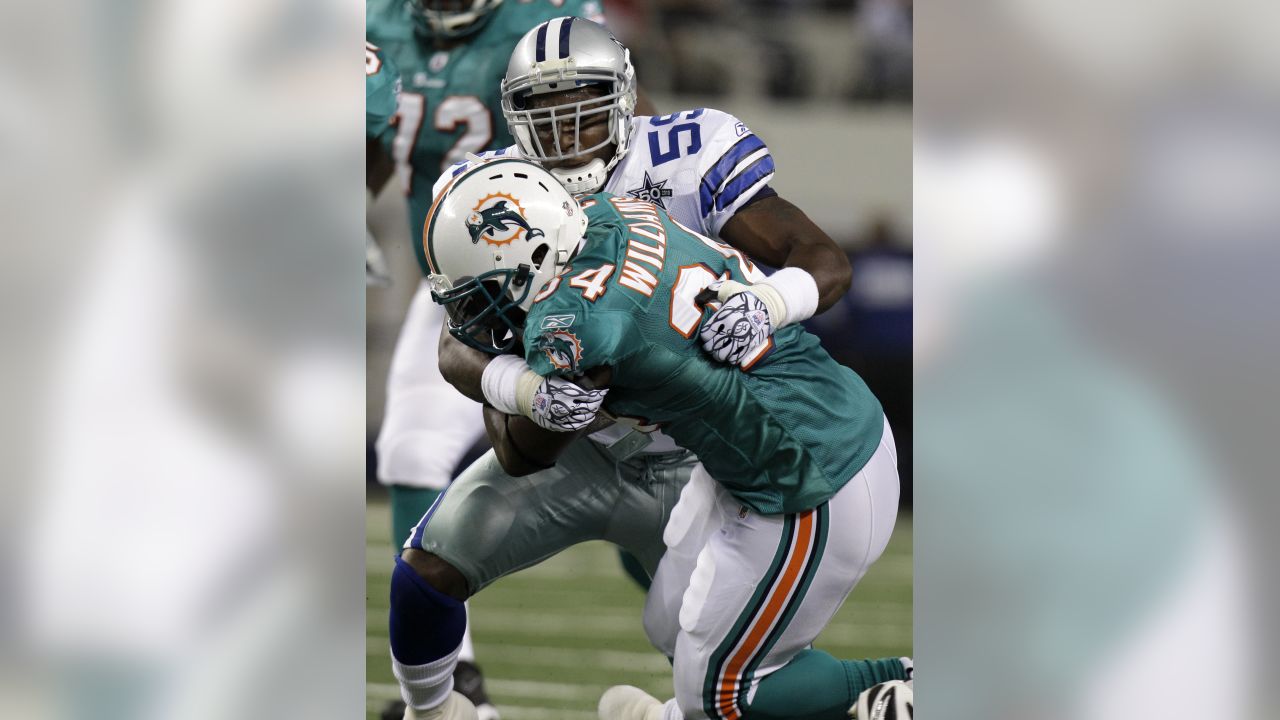 Miami Dolphins wide receiver Brandon Marshall (19) is congratulated by wide  receiver Davone Bess (15) following a reception by Marshall in the second  half of an NFL football game against the Dallas