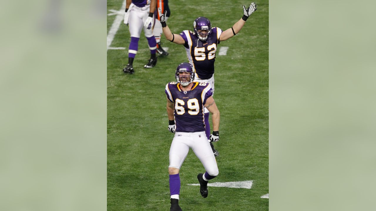 Minnesota Vikings wide receiver Charles Johnson (12) congratulated  Minnesota Vikings wide receiver Jarius Wright (17) after Wright scores a  touchdown during the second half of an NFL football game against the Miami