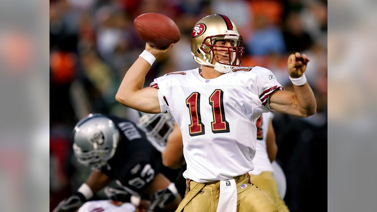 Quarterback Alex Smith of the San Francisco 49ers prepares to throw a