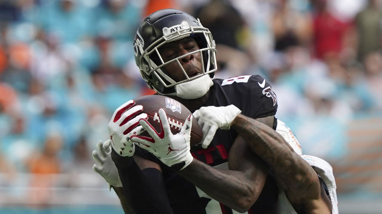 Atlanta Falcons tight end Kyle Pitts (8) participates in a jersey swap  after an NFL football game against the San Francisco 49ers, Sunday, Oct.  16, 2022, in Atlanta. The Atlanta Falcons won