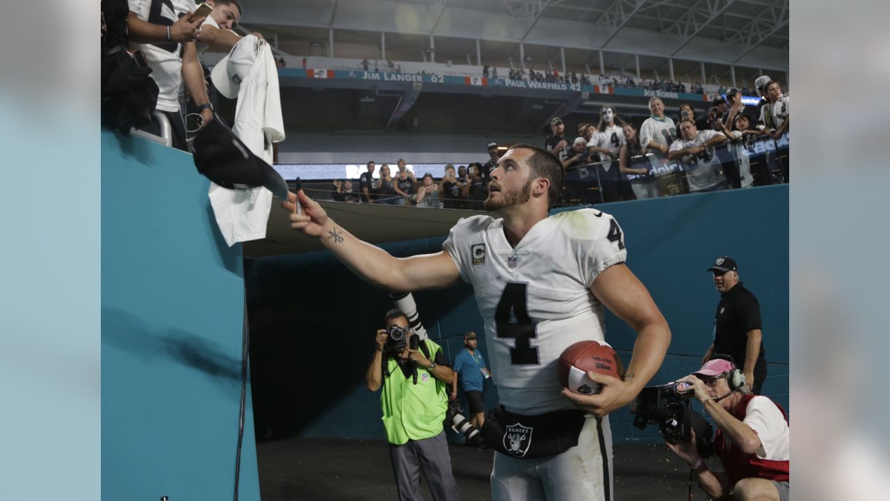 Oakland Raiders wide receiver Michael Crabtree (15) catches the ball ahead  of Miami Dolphins cornerback Cordrea Tankersley (30), during the first half  of an NFL football game, Sunday, Nov. 5, 2017 …