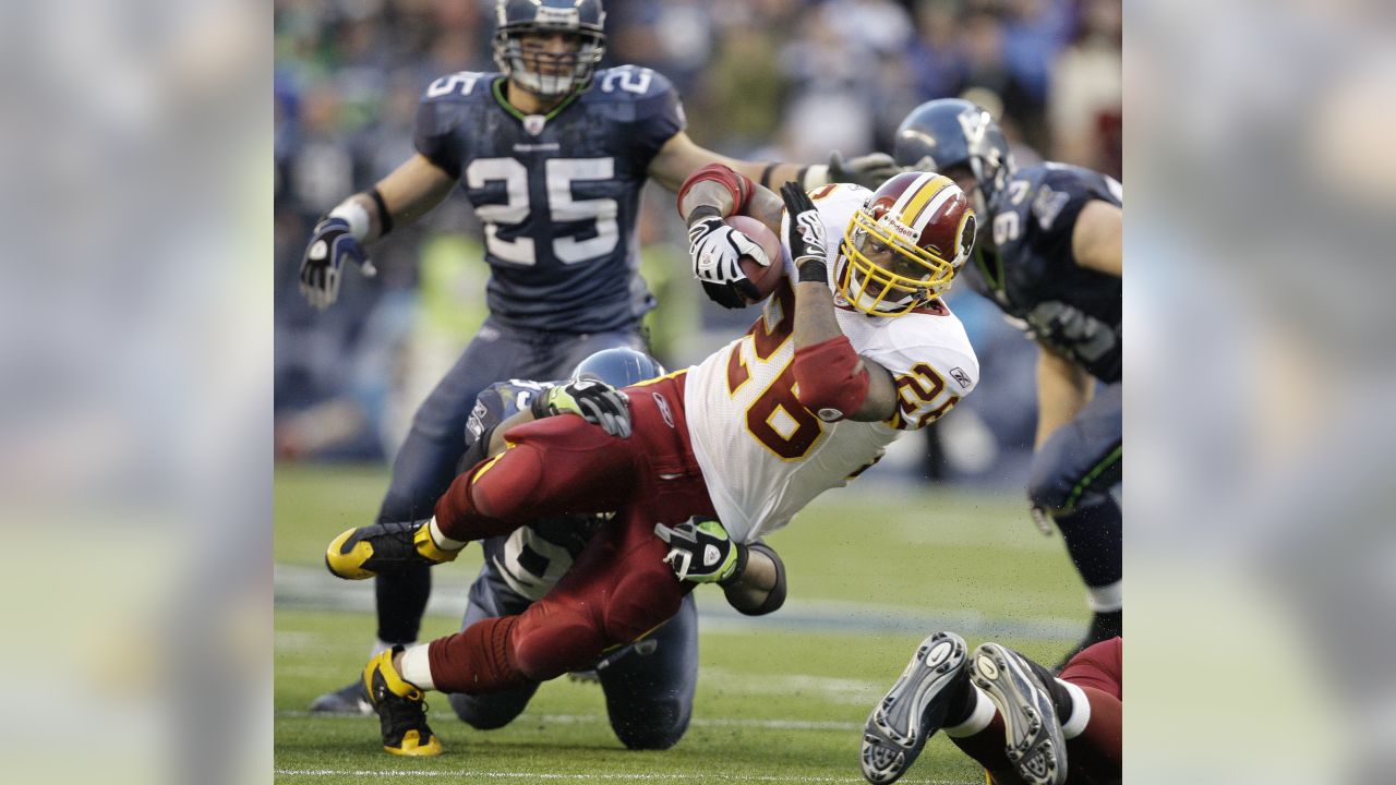 Sep 26, 2010 - St Louis, Missouri, U.S. - Washington running back CLINTON  PORTIS (26) carries the ball in the game between the St. Louis Rams and the  Washington Redskins at the