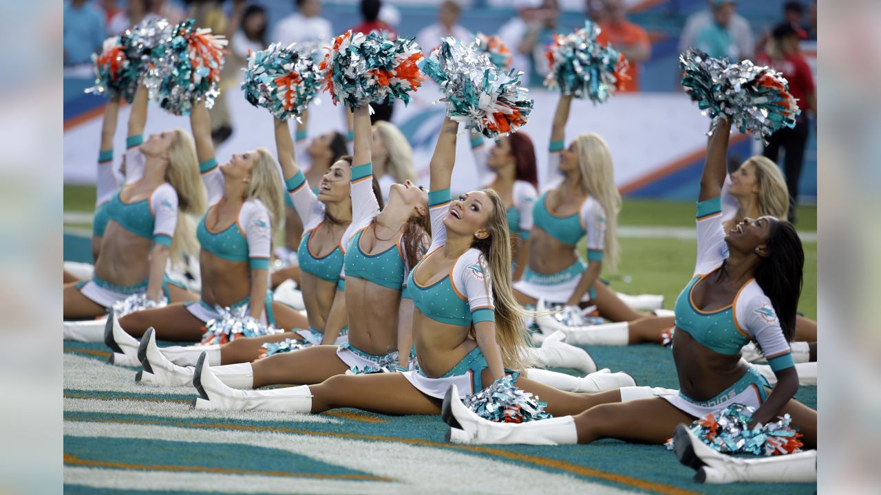 Miami Dolphins cheerleader performs during pre game wearing a