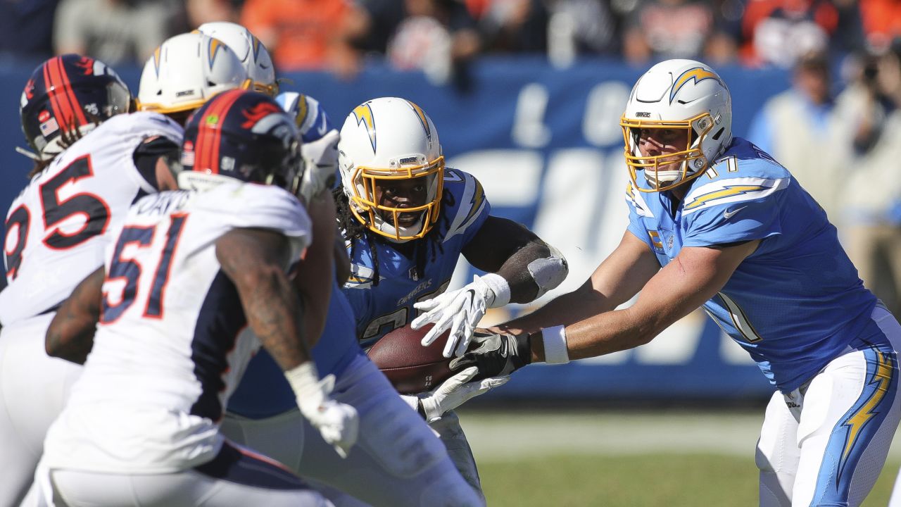 Los Angeles Chargers quarterback Philip Rivers (17) talks with