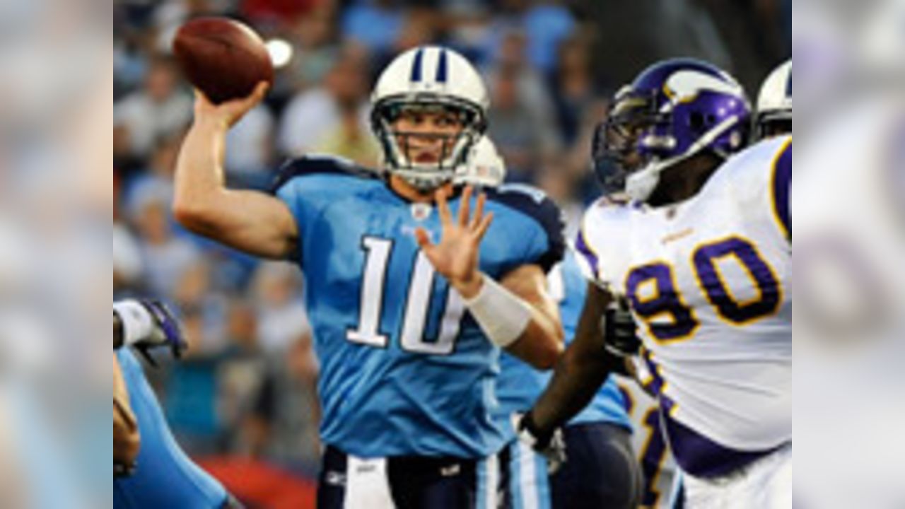 Tennessee Titans quarterback Jake Locker (10) scrambles against