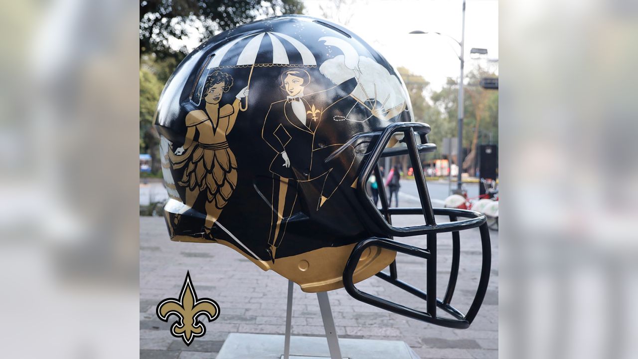 Artists take on all 32 NFL team helmets