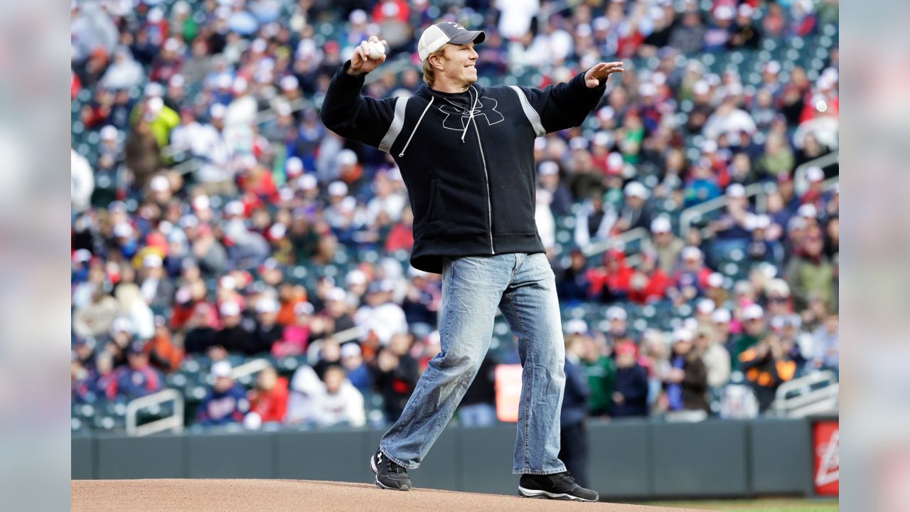 Harbaugh throws ceremonial first pitch