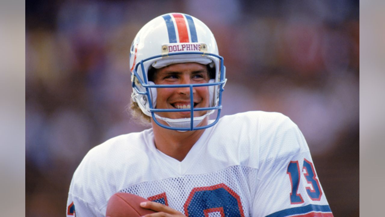 Dan Marino with his bust after his induction into the Pro Football