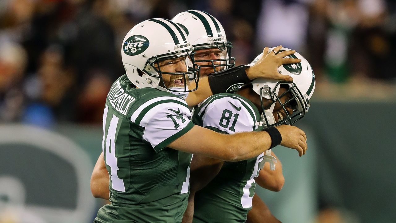 Quarterback Ryan Fitzpatrick celebrates a touchdown during the